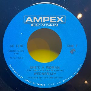 Wednesday – She's A Woman (Used Vinyl) (7'')